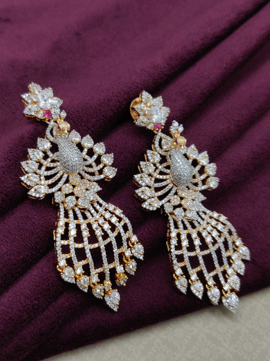 DESIGNER AD EARRINGS